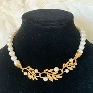 Pearls and gold.Statement piece of costume jewelry